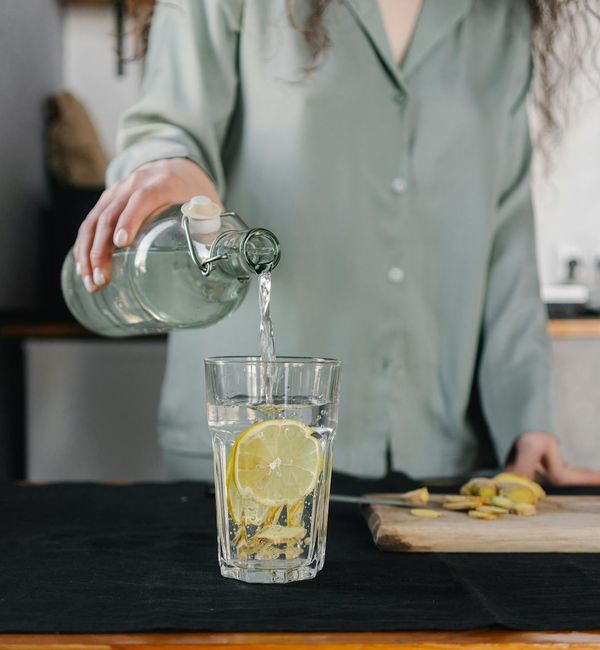 Smiling woman feeling refreshed and energetic after yoga practice.