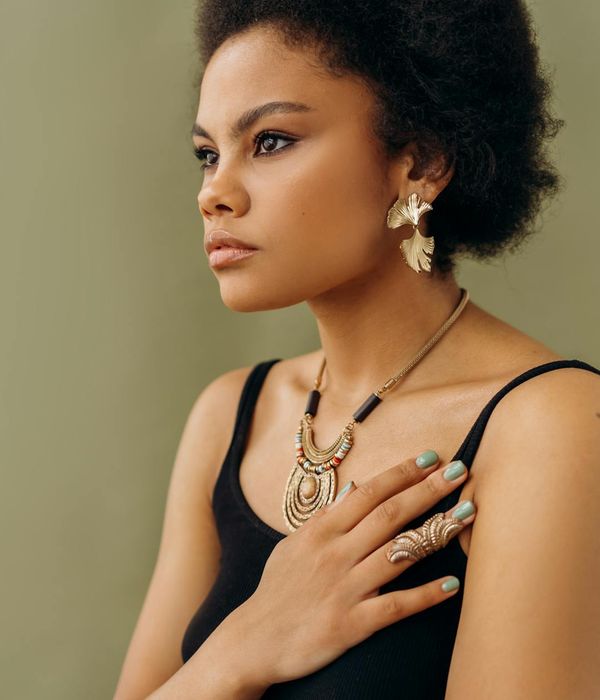 Woman in a graceful yoga pose focusing on her breath.